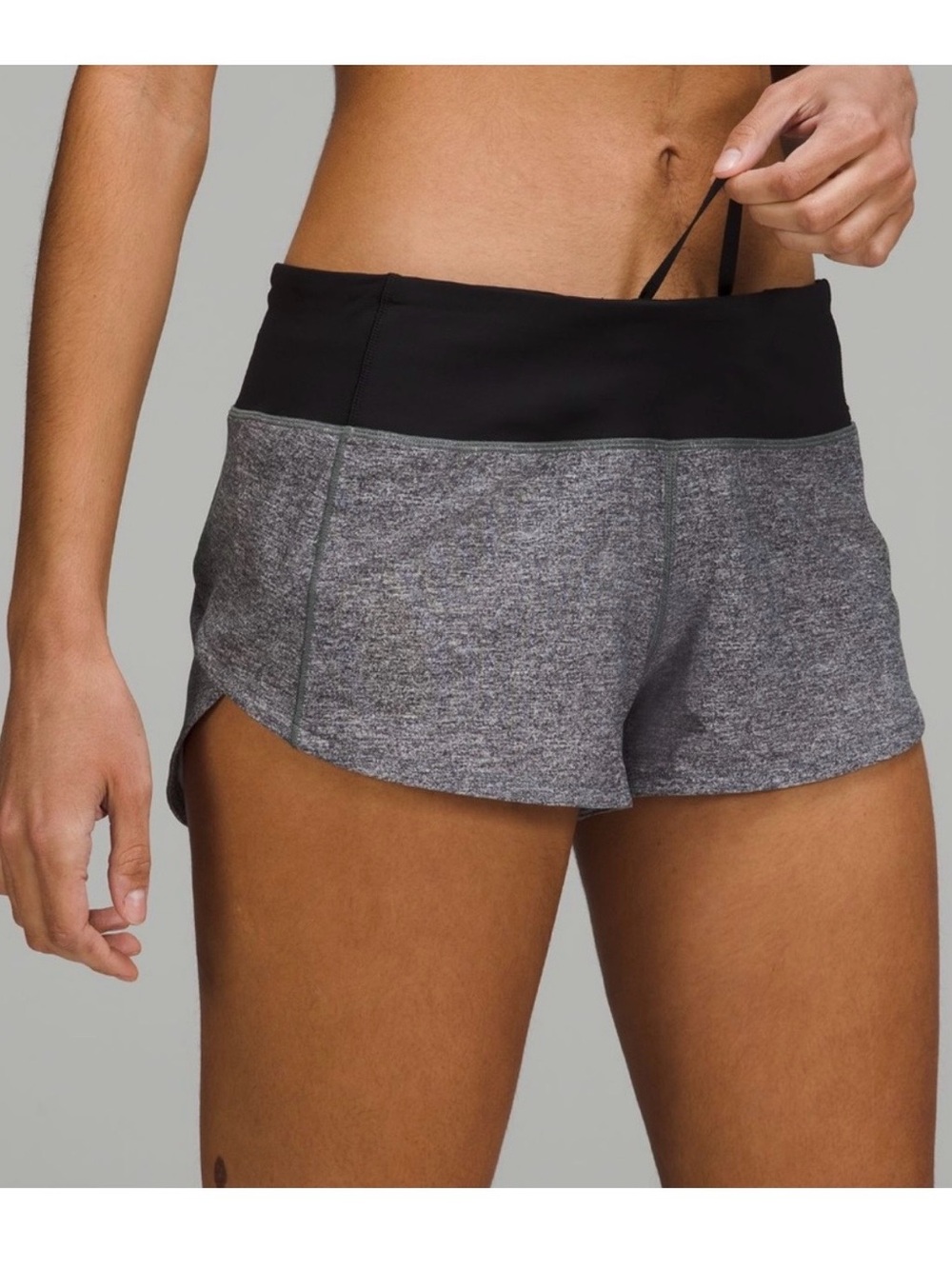 Woman’s size 8 Lululemon Grey and black speed up shorts